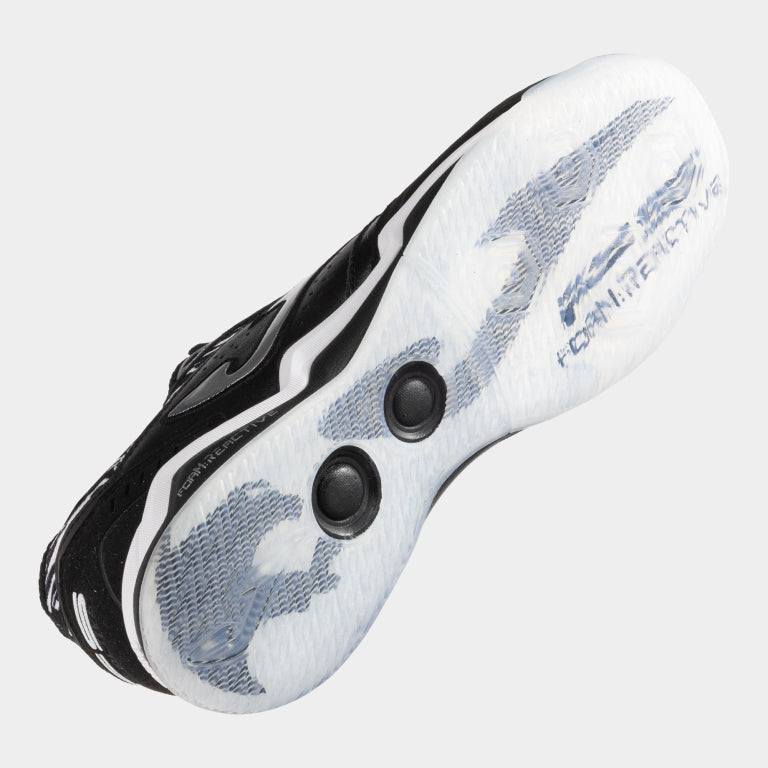 Underside of JOMA FS Reactive 2501 with black rubber sole, multi-stud traction, and flex grooves for indoor turf play.
