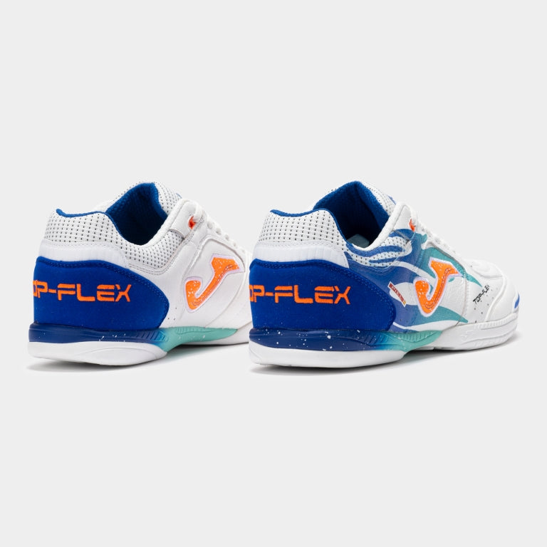 Heel view of the JOMA Top Flex 2576 turf shoe in white/royal, showing padded collar and heel structure.
