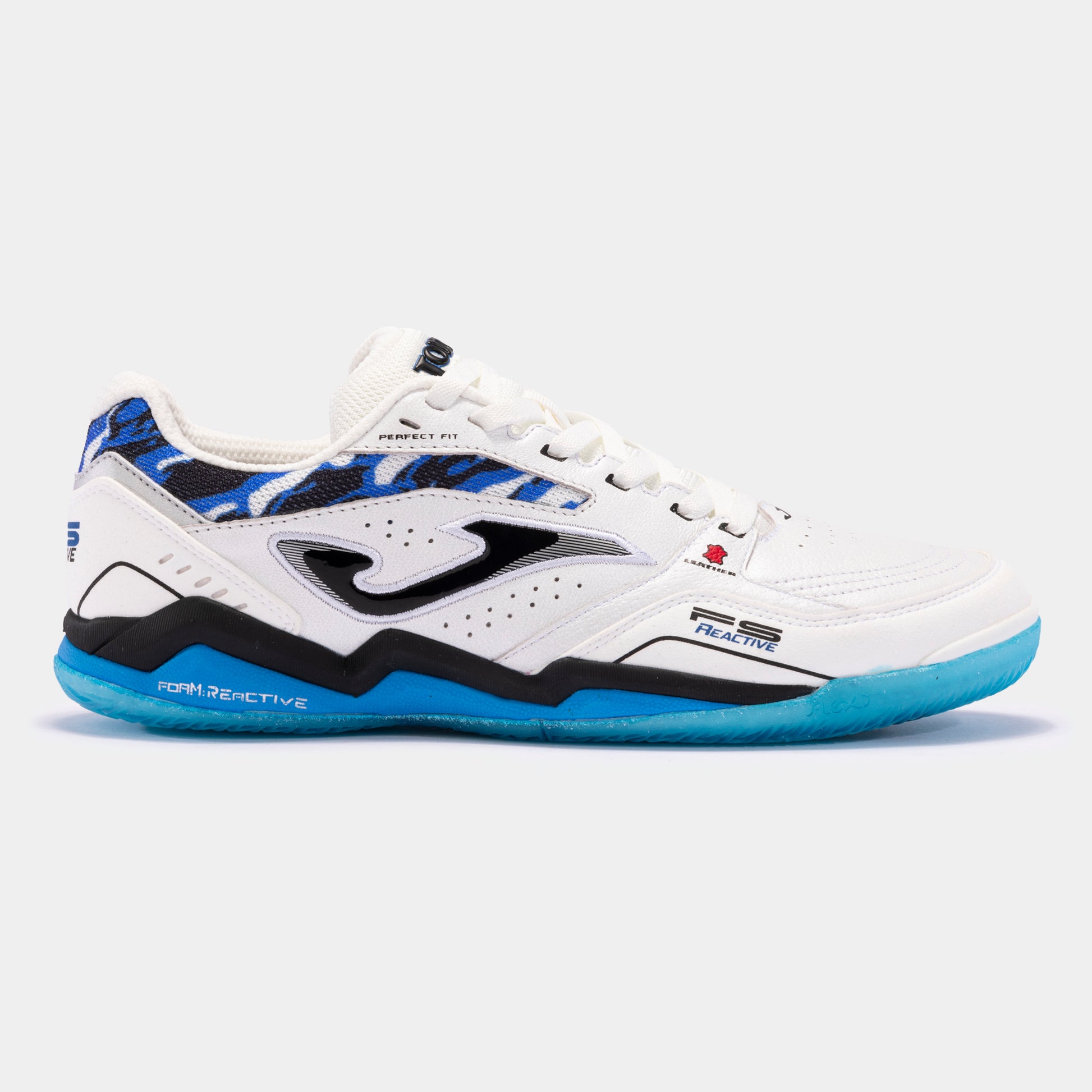 JOMA FS Reactive 2432 turf football shoe in white and royal blue, side view showing leather upper, VTS vents, and toe protection.