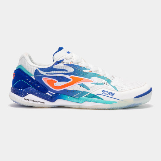 JOMA FS Reactive 2576 turf football shoe in white and royal blue, side view showing leather upper and toe protection.